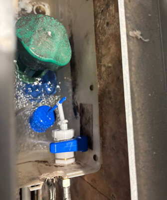 Replacement valve and fittings inside a boiler casing during a repair