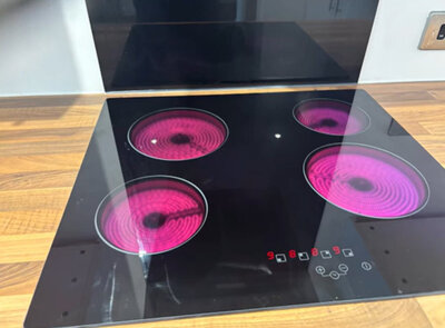 Newly installed ceramic hob tested in a refitted kitchen