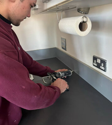 Sealing a newly fitted kitchen worktop against the wall