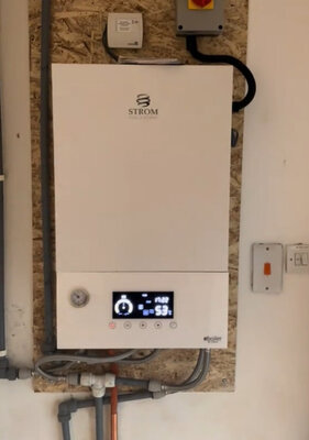 New wall-mounted electric boiler installed and commissioned