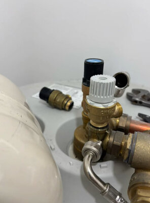 Pressure relief valve and brass fittings on a newly installed cylinder