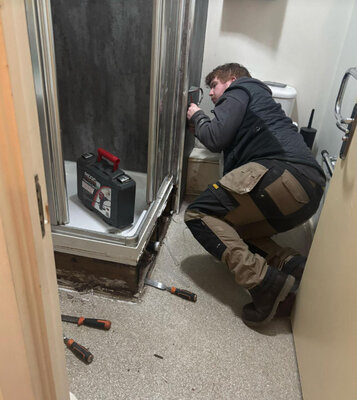 Fitting a new shower enclosure in a bathroom refurbishment