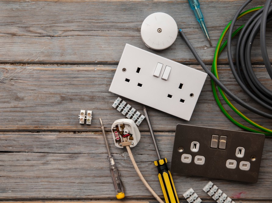 Electrician carrying out electrical services on a property in Cheshire