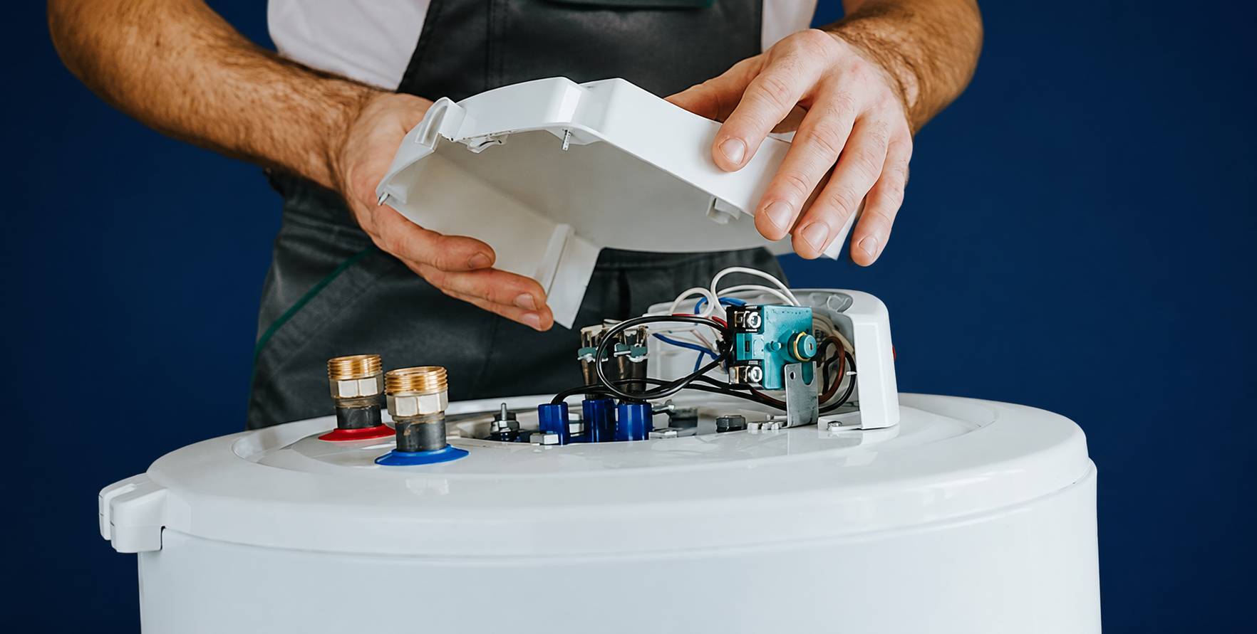 Engineer completing an electric boiler installation in a Cheshire property