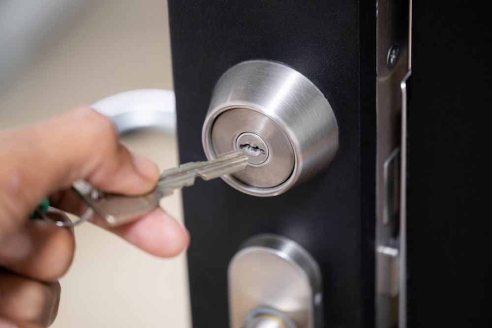 Locksmith changing a door cylinder between tenancies in Cheshire